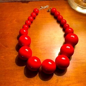 Red Beaded necklace. Approx 18 inches. Never used!